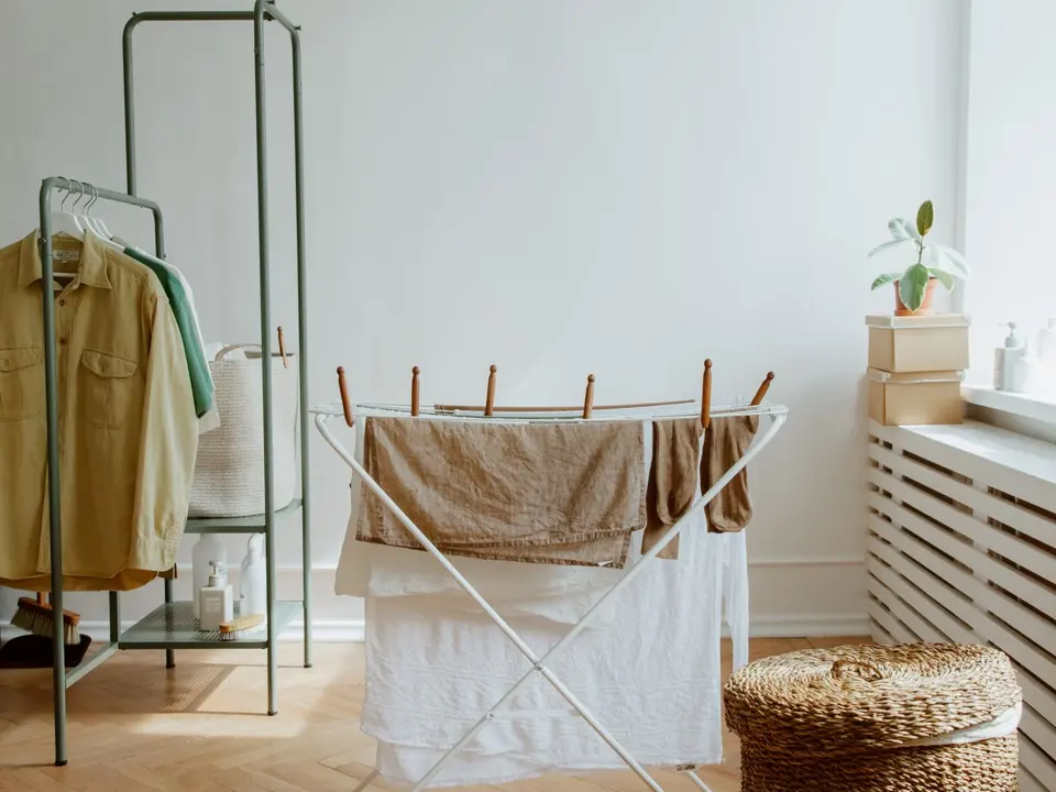 A bright laundry room with a wicker basket